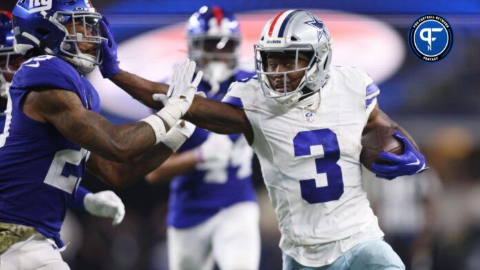 Dallas Cowboys wide receiver Brandin Cooks (3) stiff arms New York Giants safety Xavier McKinney (29) in the third quarter at AT&T Stadium.