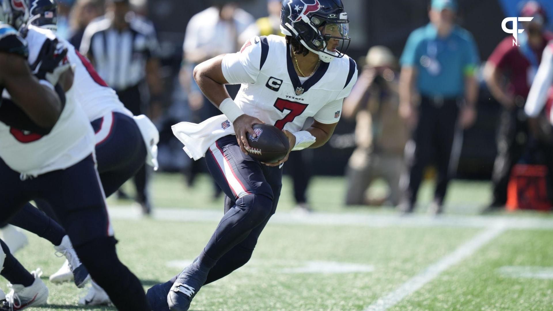 Houston Texans quarterback C.J. Stroud (7) turns to hand off the ball during the first quarter against the Carolina Panthers at Bank of America Stadium.