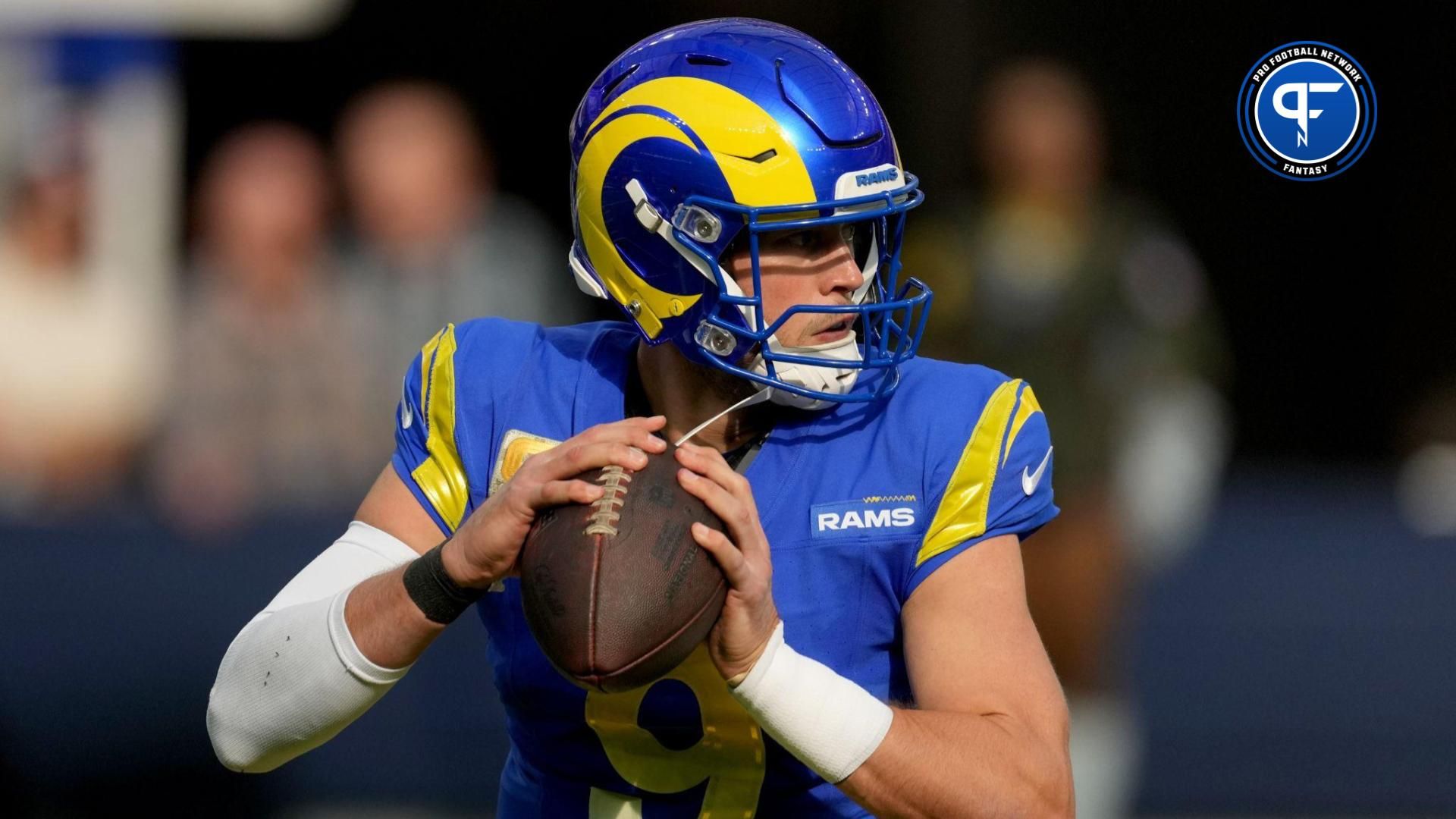Matthew Stafford (9) looks to pass against the Seattle Seahawks in the first quarter at SoFi Stadium.