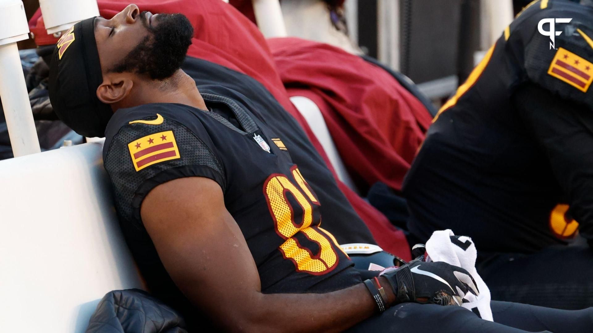 Washington Commanders wide receiver Jamison Crowder (83) reacts on the bench against the New York Giants in the final seconds during the fourth quarter at FedExField.