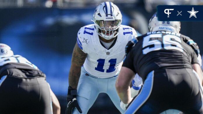 Micah Parsons (11) eyes the offense during the second quarter against the Carolina Panthers at Bank of America Stadium.