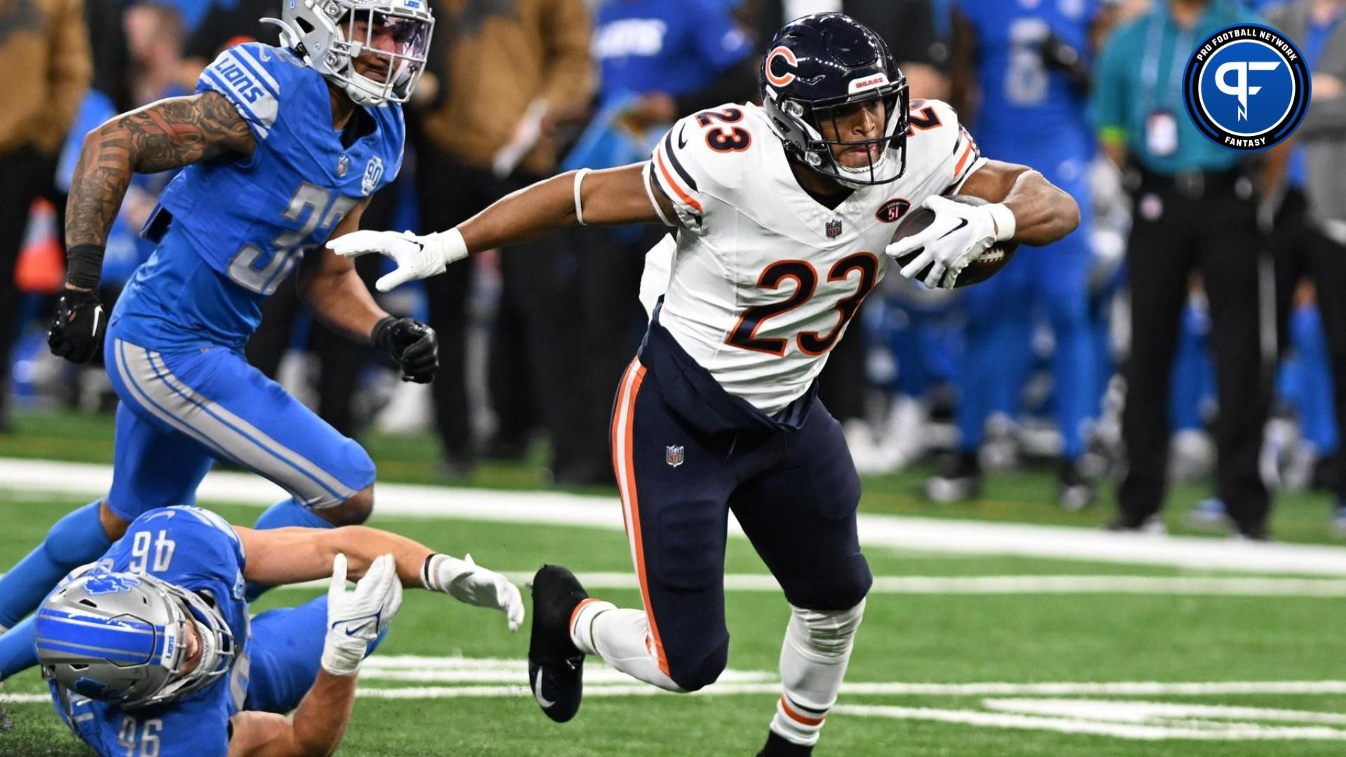 Chicago Bears running back Roschon Johnson (23) runs the ball against the Detroit Lions in the third quarter at Ford Field.
