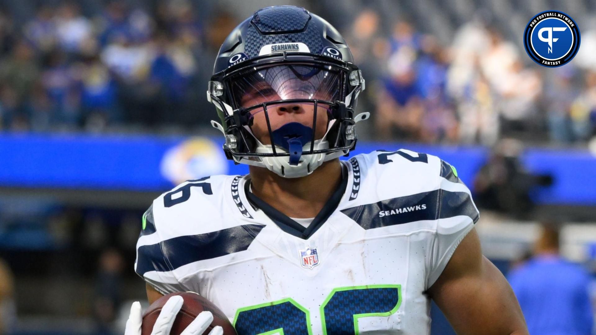 Seattle Seahawks running back Zach Charbonnet (26) carries the ball during pre-game warmups before and NFL game against the Los Angeles Rams at SoFi Stadium.