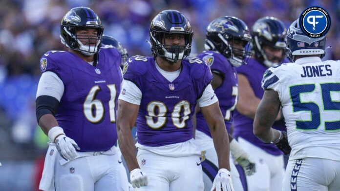 Isaiah Likely (80) celebrates after getting a first down against the Seattle Seahawks during the fourth quarter at M&T Bank Stadium.