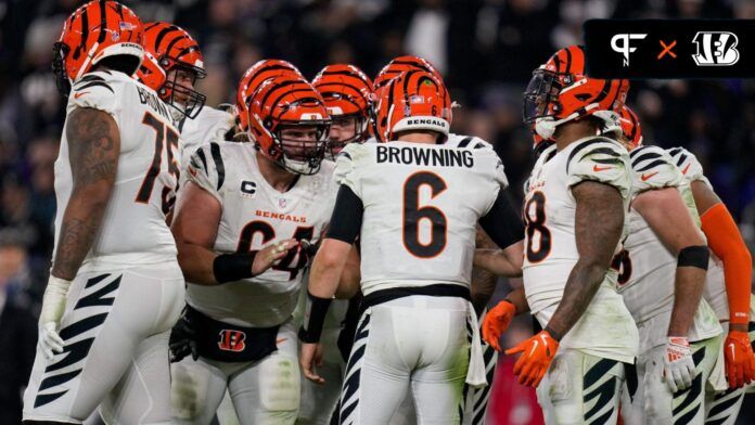 Jake Browning (6) stands in the huddle in the fourth quarter of the NFL Week 11 game between the Baltimore Ravens and the Cincinnati Bengals at M&T Bank Stadium.