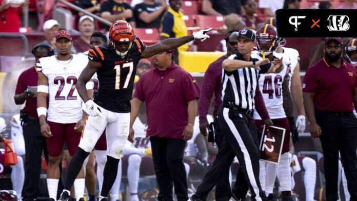 Stanley Morgan (17) points towards a penalty flag during the NFL preseason week 3 game between the Cincinnati Bengals and the Washington Commanders at FedEx Field.