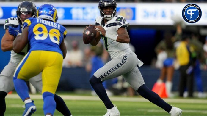 Seattle Seahawks QB Geno Smith (7) looks to pass against the Los Angeles Rams.