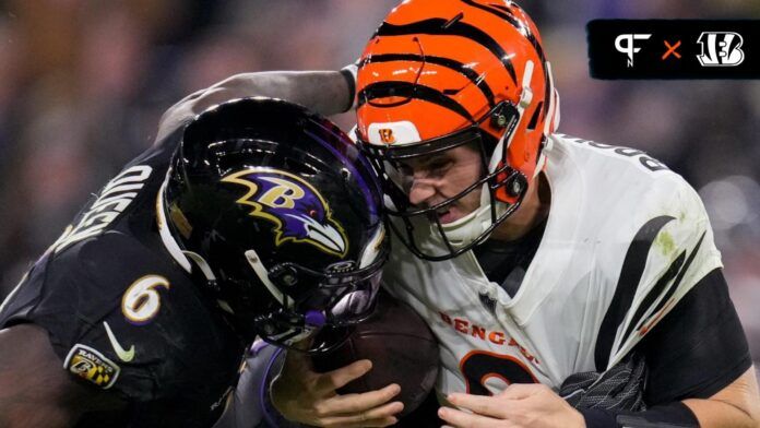 Cincinnati Bengals QB Jake Browning (6) gets hit by Baltimore Ravens LB Patrick Queen (6).