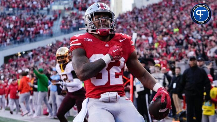 Nov 18, 2023; Columbus, Ohio, USA; Ohio State Buckeyes running back TreVeyon Henderson (32) celebrates a touchdown during the NCAA football game against the Minnesota Golden Gophers at Ohio Stadium.