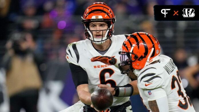 Cincinnati Bengals quarterback Jake Browning (6) hands off to running back Trayveon Williams (32) in the fourth quarter of the NFL Week 11 game between the Baltimore Ravens and the Cincinnati Bengals.