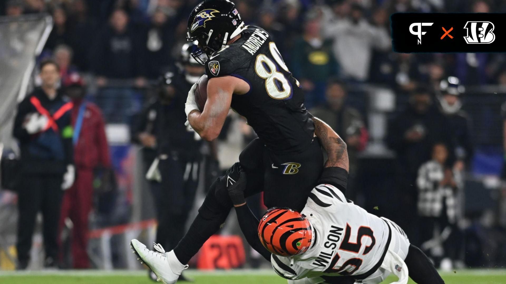 Mark Andrews (89) runs after a catch during the first quarter against Cincinnati Bengals linebacker Logan Wilson (55) at M&T Bank Stadium.