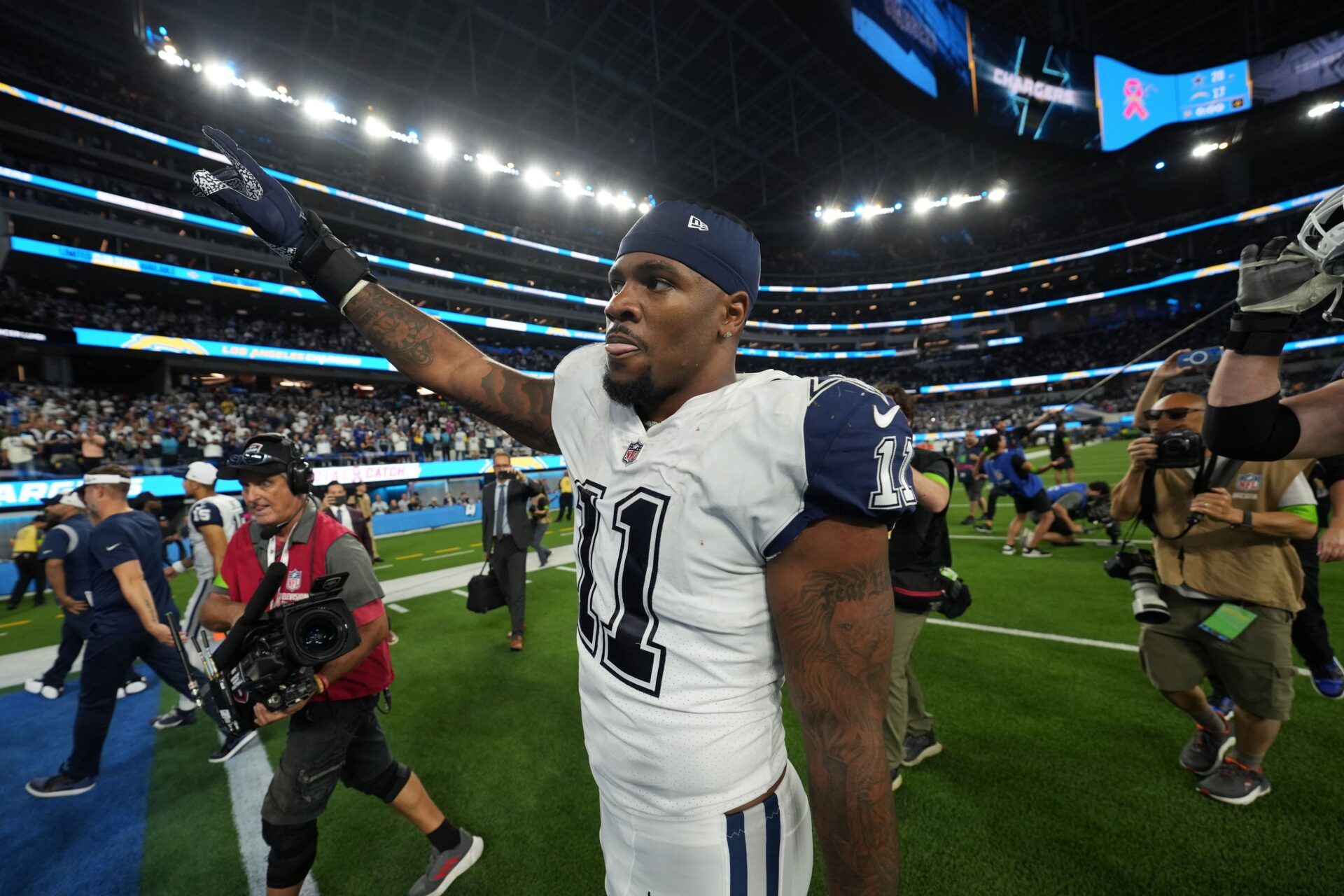 Micah Parsons (11) leaves the field after the game against the Los Angeles Chargers at SoFi Stadium.