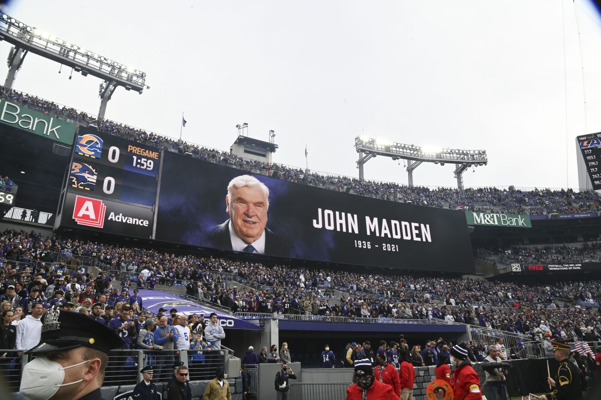 A moment of silence is held for John Madden before the game between the Baltimore Ravens and the Los Angeles Rams at M&T Bank Stadium.