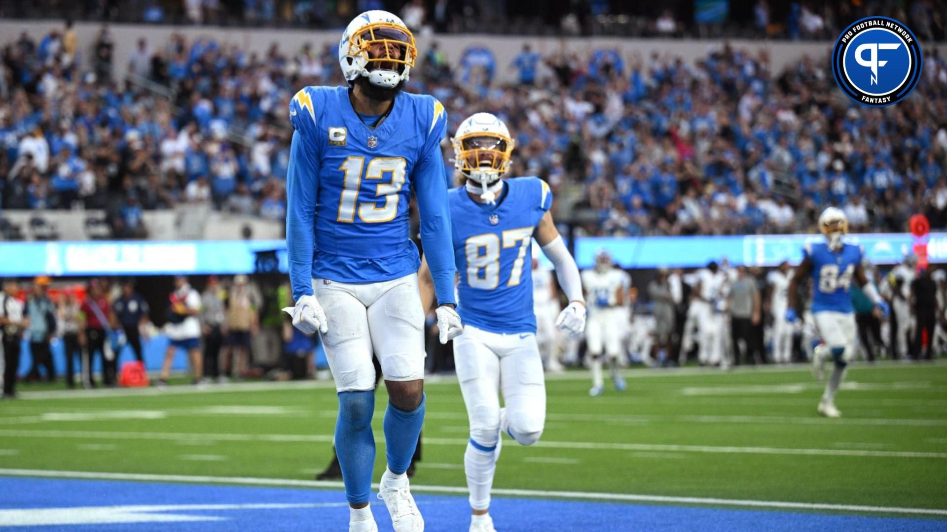 Los Angeles Chargers wide receiver Keenan Allen (13) celebrates after scoring a touchdown against the Detroit Lions during the second half at SoFi Stadium.