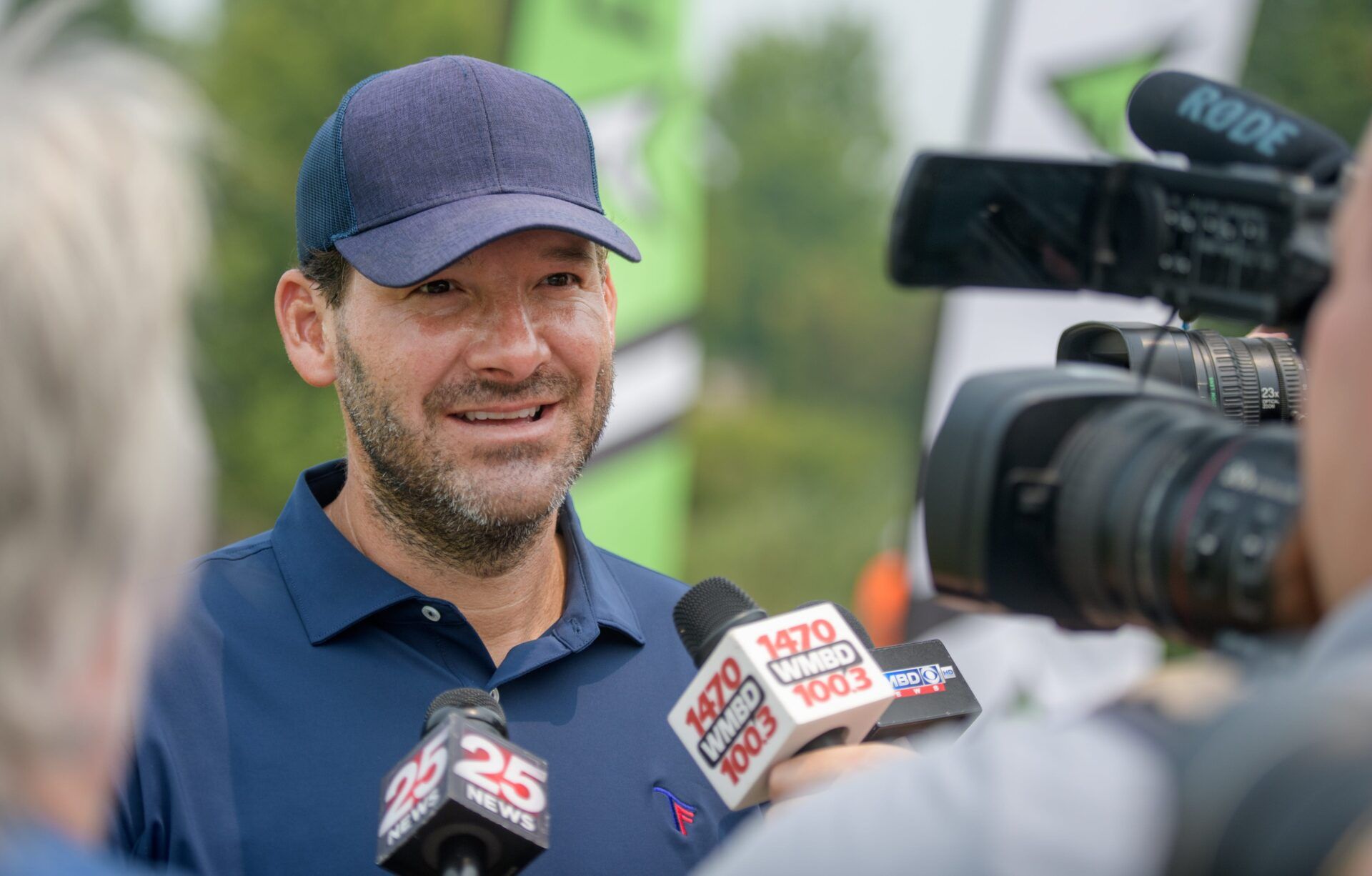 CBS sportscaster and former NFL quarterback Tony Romo chats with the media.