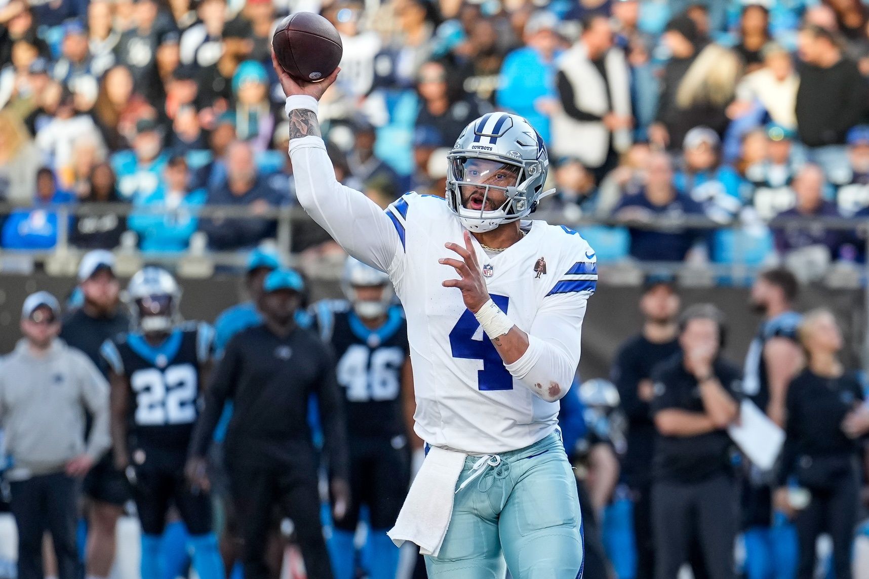 Dallas Cowboys quarterback Dak Prescott (4) makes a throw against the Carolina Panthers.