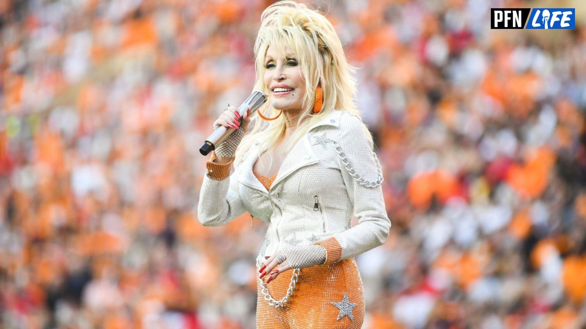 Dolly Parton sings Rocky Top during a football game between Tennessee and Georgia at Neyland Stadium in Knoxville, Tenn., on Saturday, Nov. 18, 2023.