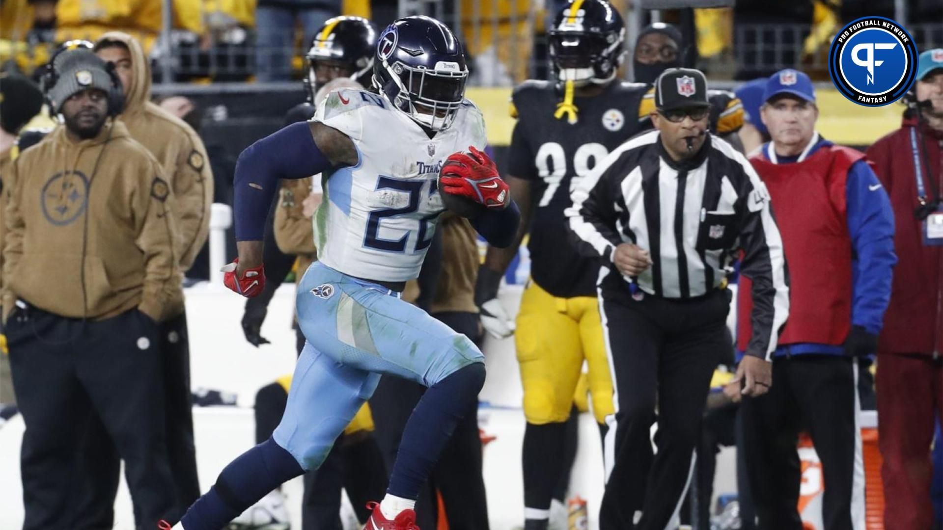 Derrick Henry (22) runs against the Pittsburgh Steelers during the third quarter at Acrisure Stadium.