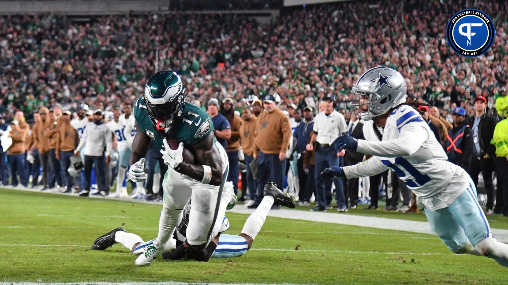 Philadelphia Eagles wide receiver A.J. Brown (11) scores a touchdown against Dallas Cowboys cornerback DaRon Bland (26) during the third quarter at Lincoln Financial Field.