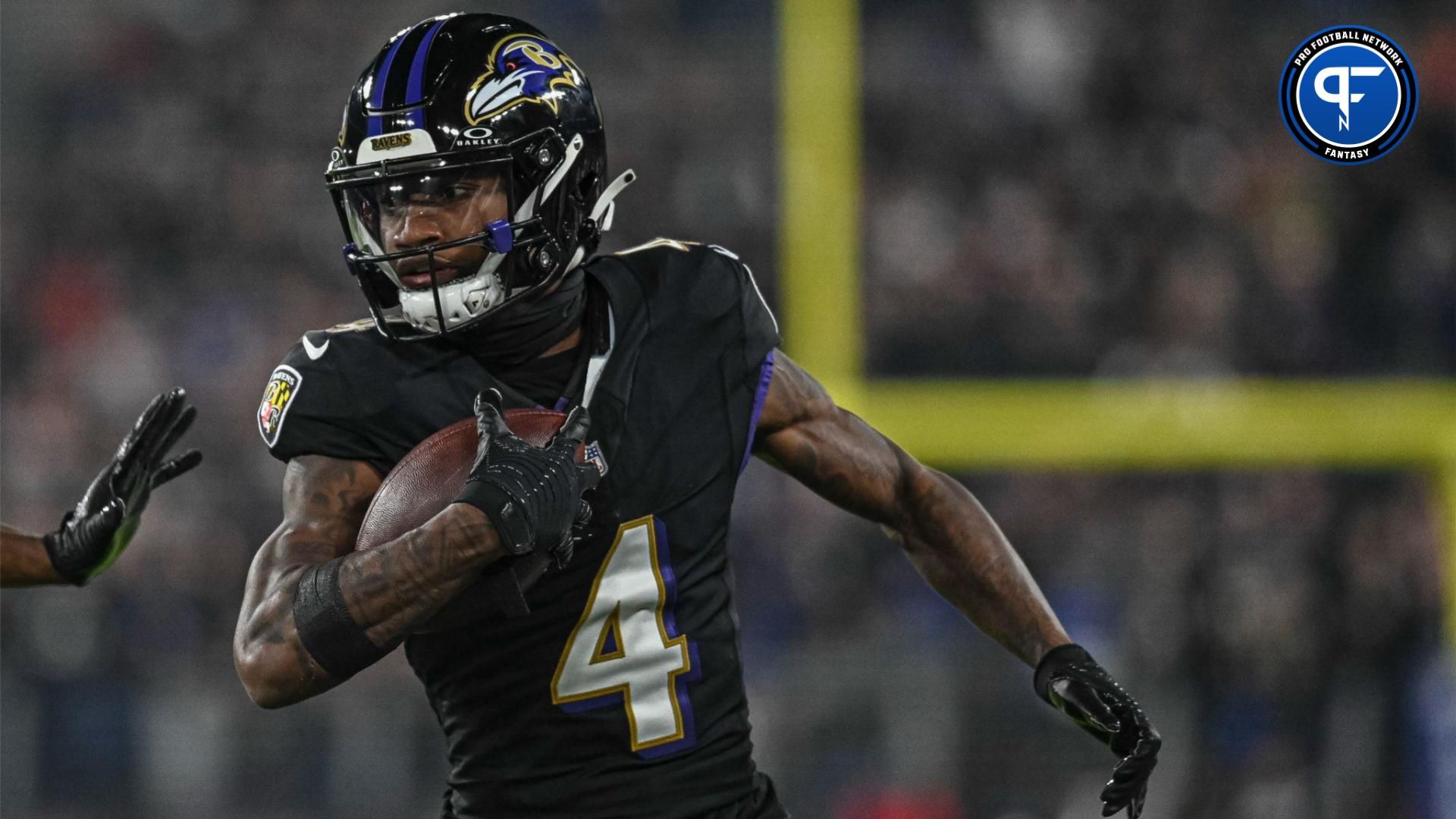 Baltimore Ravens wide receiver Zay Flowers (4) runs after a first half catch against the Cincinnati Bengals at M&T Bank Stadium.