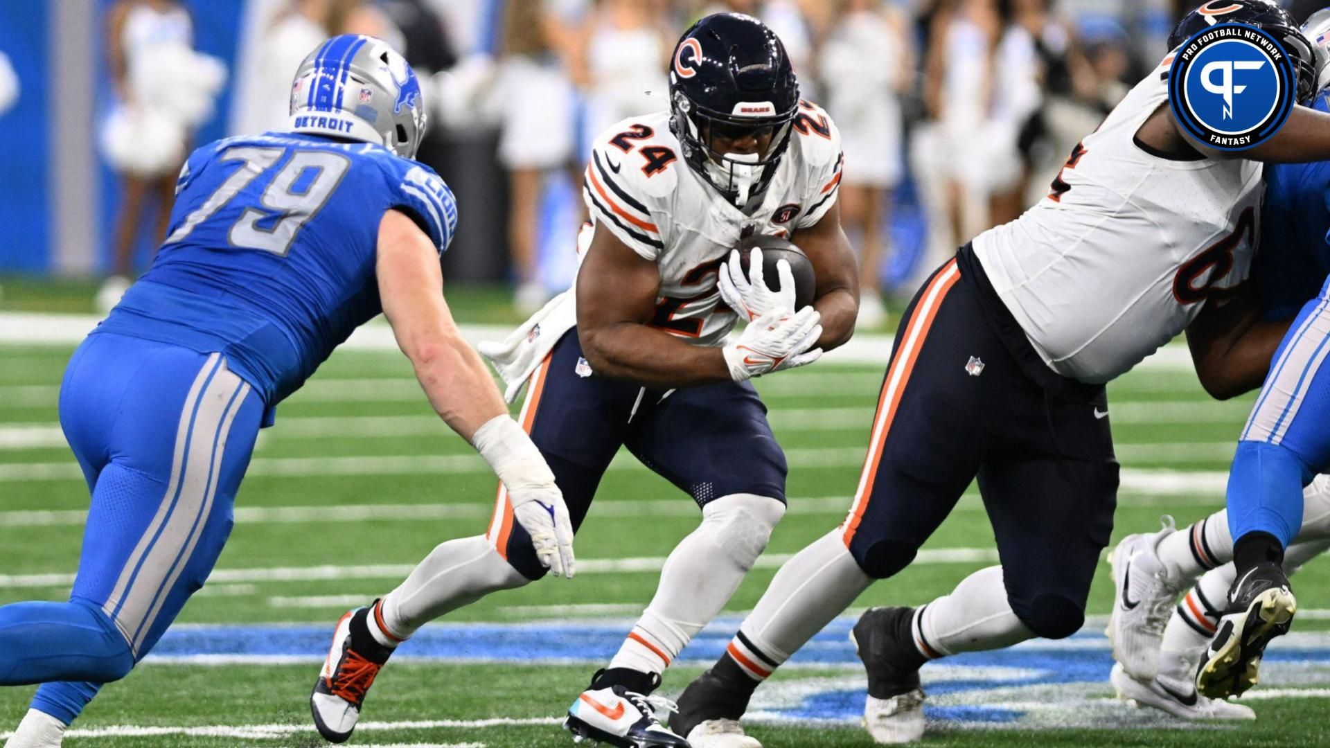 Chicago Bears running back Khalil Herbert (24) runs the ball against the Detroit Lions in the third quarter at Ford Field.