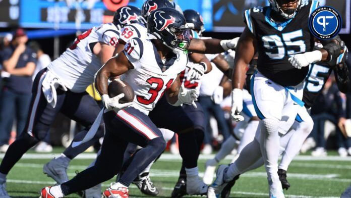 Houston Texans running back Dameon Pierce (31) runs in the third quarter at Bank of America Stadium.