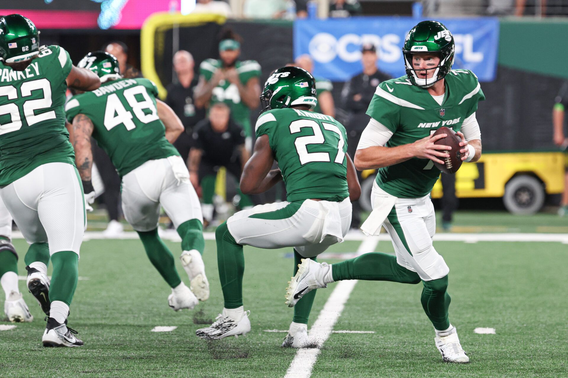 New York Jets quarterback Tim Boyle (7) drops back top pass as running back Zonovan Knight (27) blocks during the second half against the Tampa Bay Buccaneers at MetLife Stadium.