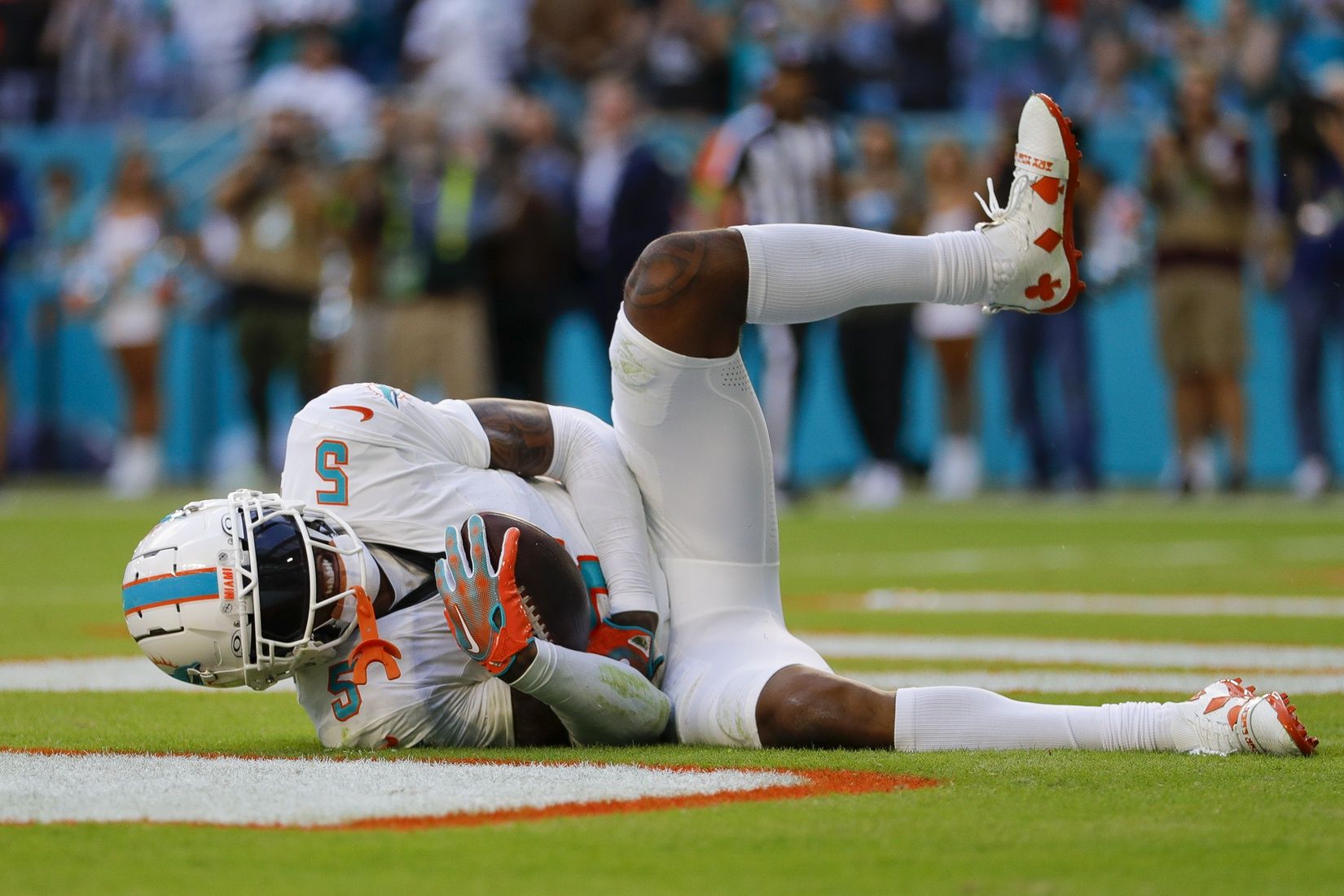 Miami Dolphins cornerback Jalen Ramsey (5) intercepts a pass against the Las Vegas Raiders.