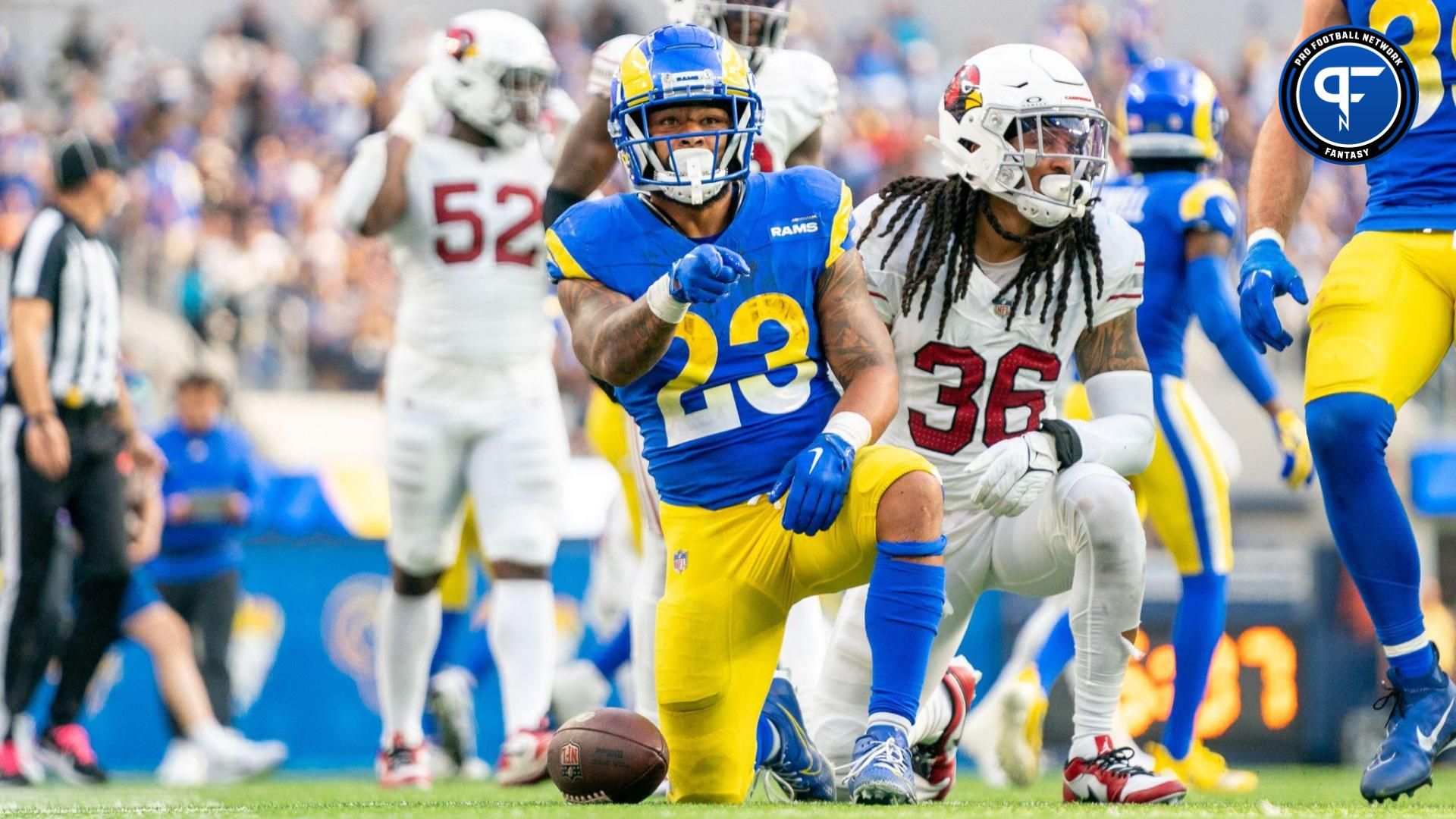 Los Angeles Rams running back Kyren Williams (23) celebrates a first down during the third quarter against the Arizona Cardinals at SoFi Stadium.