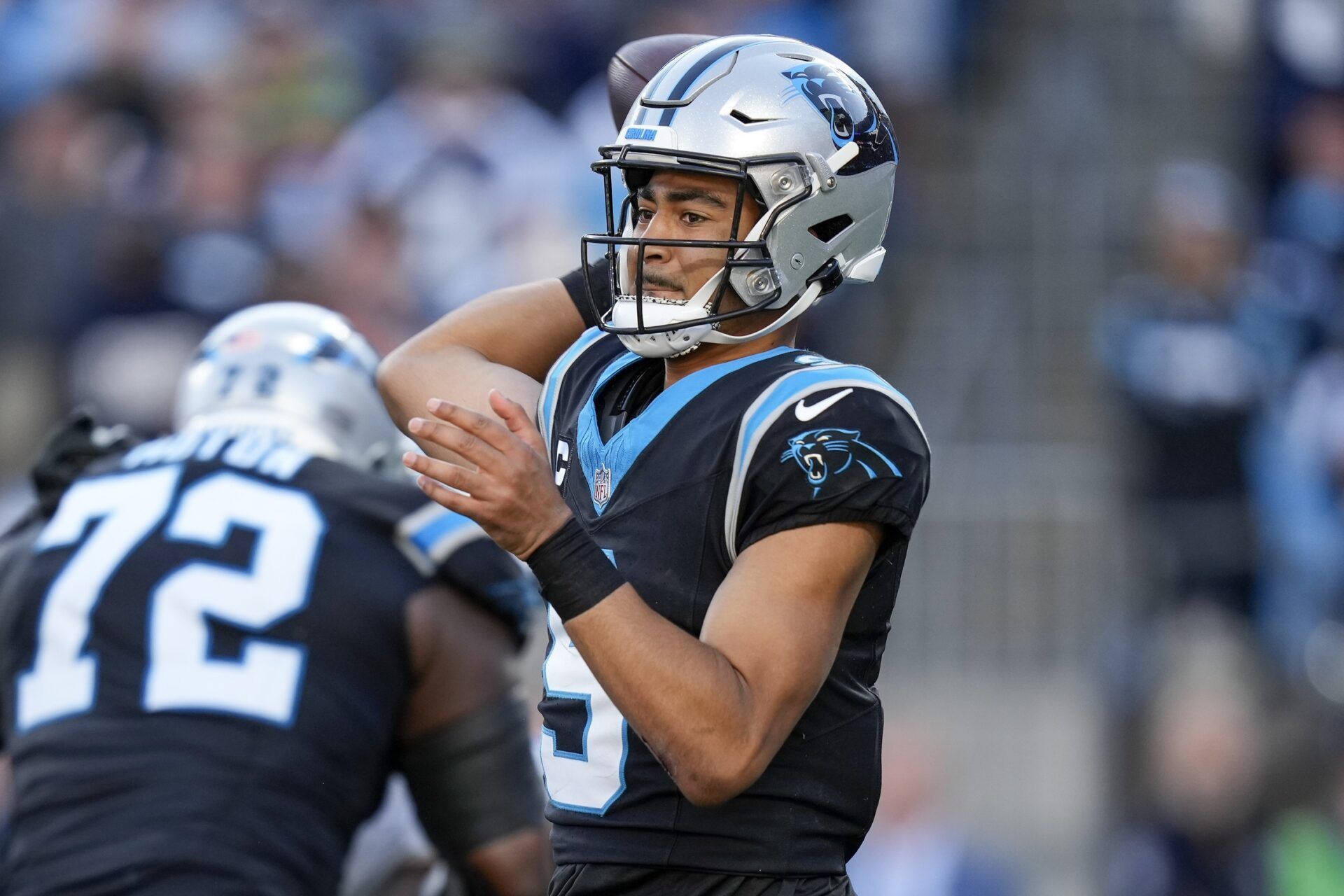 Bryce Young (9) throws during the second half against the Dallas Cowboys at Bank of America Stadium.