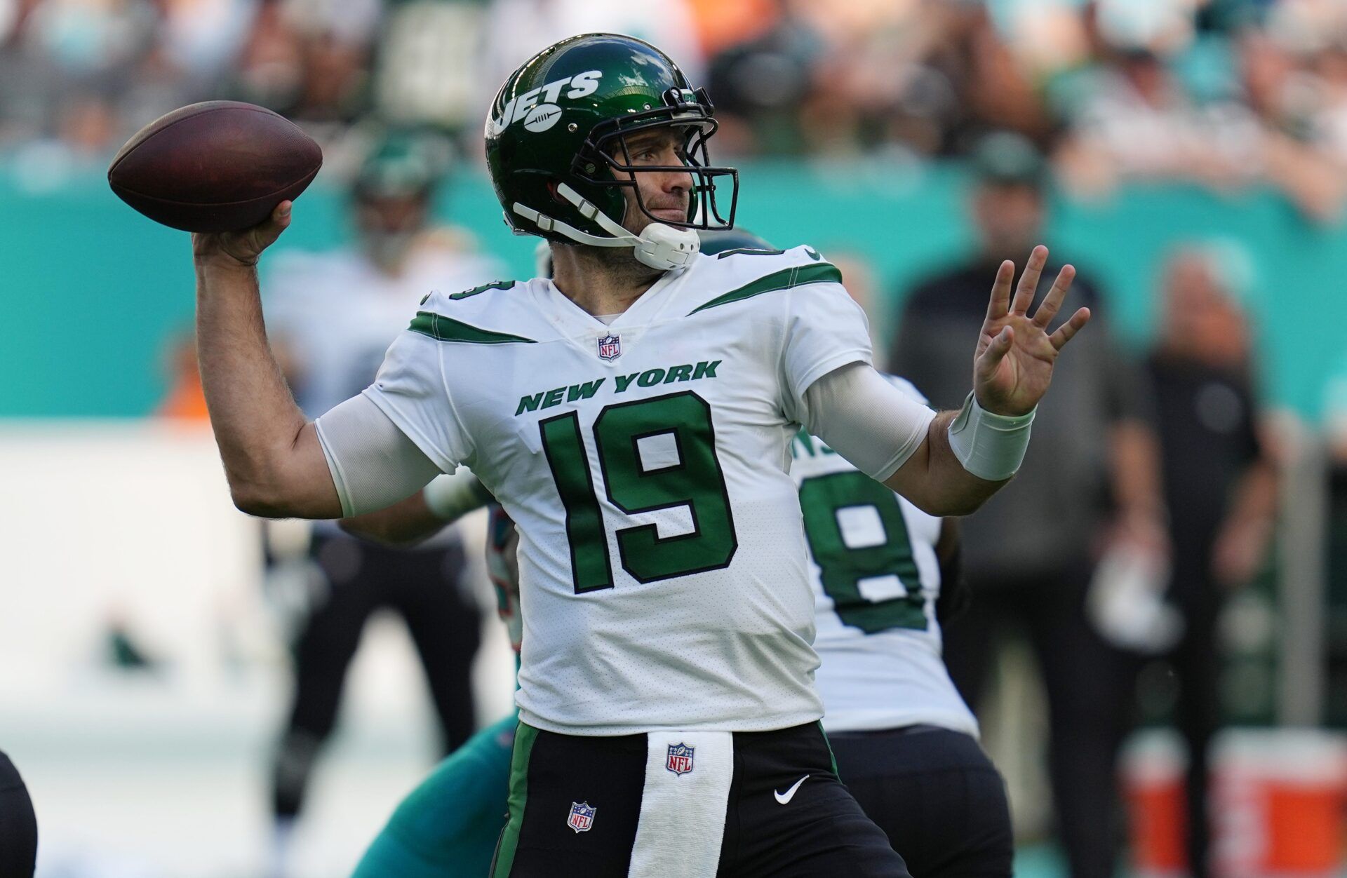 New York Jets quarterback Joe Flacco (19) drops back to pass against the Miami Dolphins during the second half of an NFL game at Hard Rock Stadium.