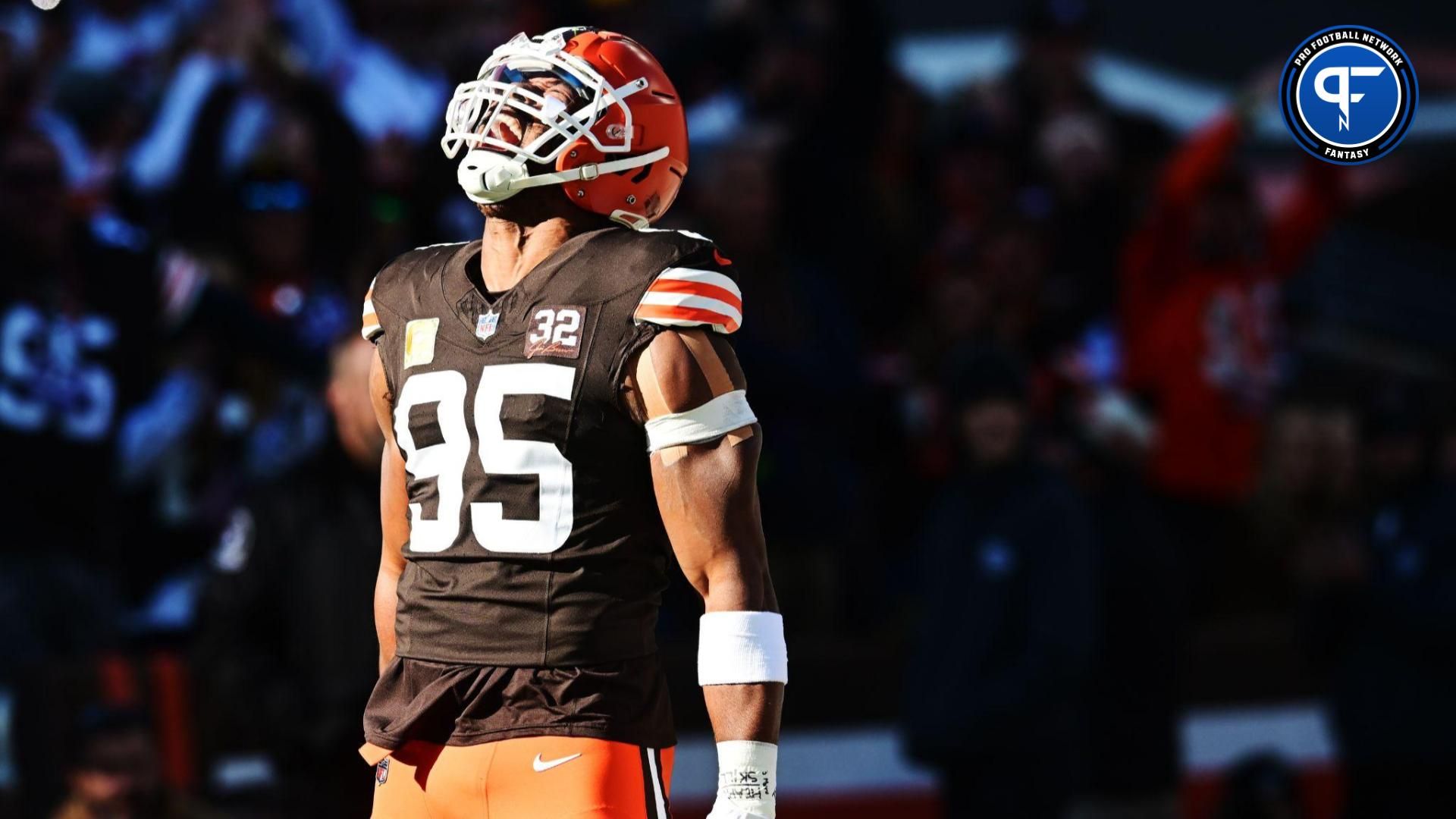 Myles Garrett (95) celebrates after sacking Pittsburgh Steelers quarterback Kenny Pickett (not pictured) during the first quarter at Cleveland Browns Stadium.