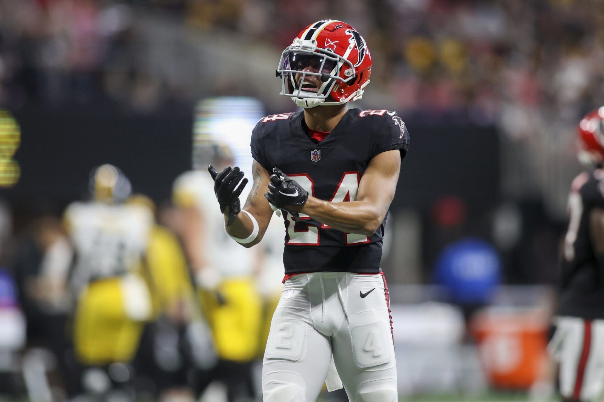 Atlanta Falcons cornerback A.J. Terrell (24) reacts after a play against the Pittsburgh Steelers in the first quarter at Mercedes-Benz Stadium.