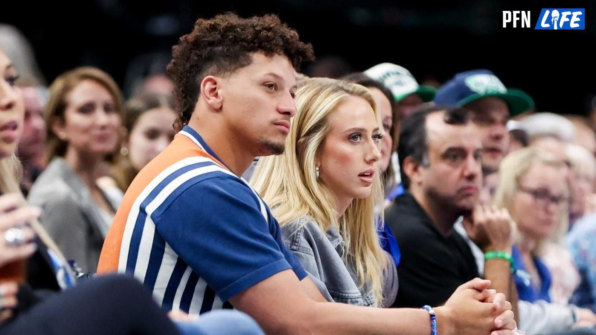 Patrick Mahomes II and his wife Brittany watch the game between the Dallas Mavericks and Toronto Raptors at American Airlines Center.