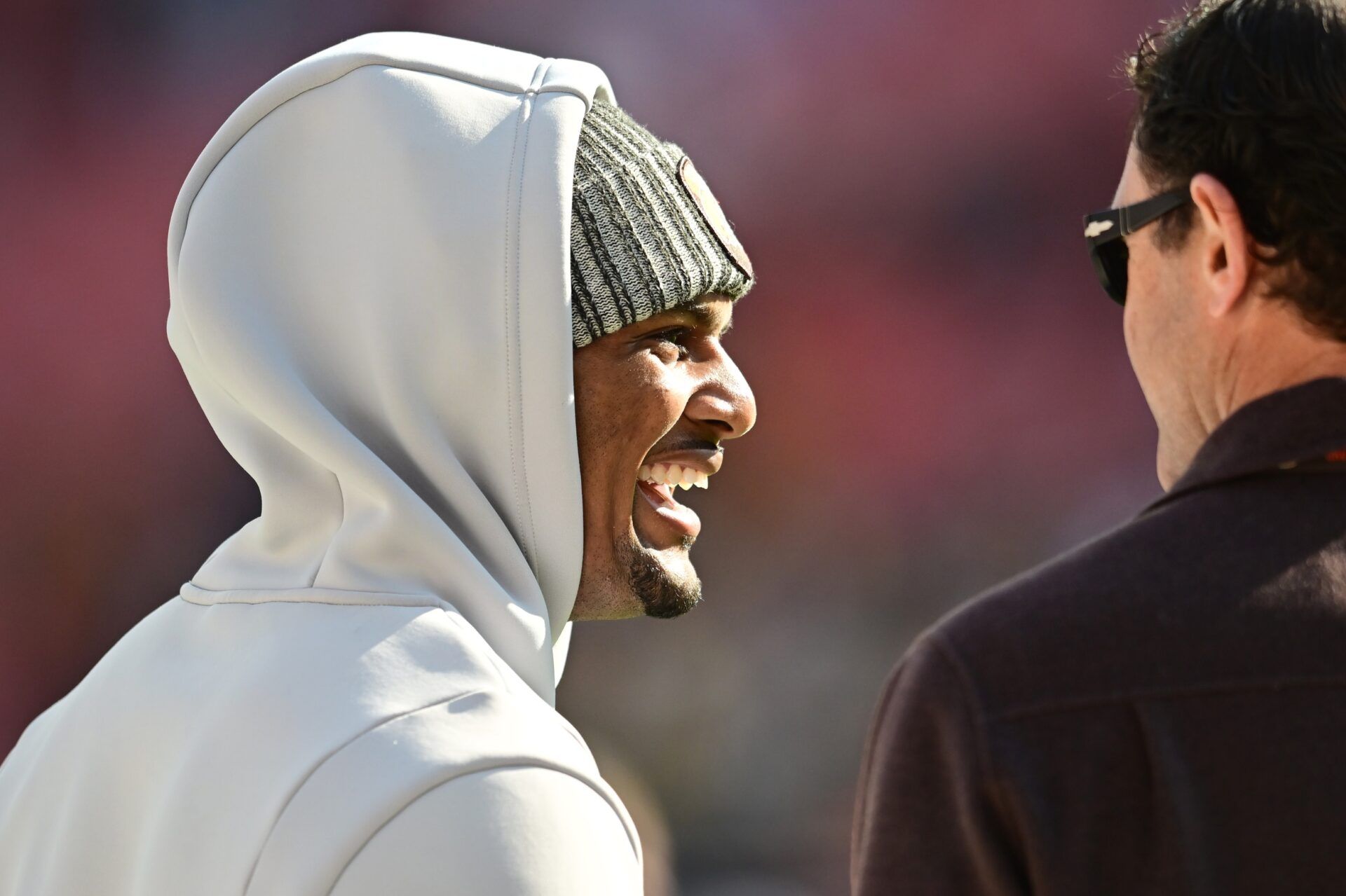 Cleveland Browns quarterback Deshaun Watson, left, smiles before the game between the Browns and the Pittsburgh Steelers at Cleveland Browns Stadium.