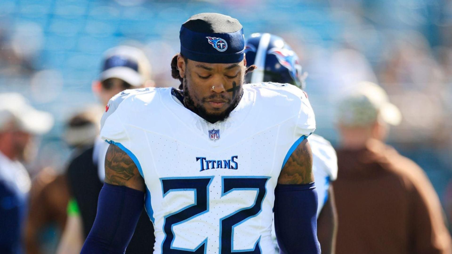 Tennessee Titans running back Derrick Henry (22) warms up before an NFL football matchup Sunday, Nov. 19, 2023 at EverBank Stadium in Jacksonville, Fla. The Jacksonville Jaguars defeated the Tennessee Titans 34-14.