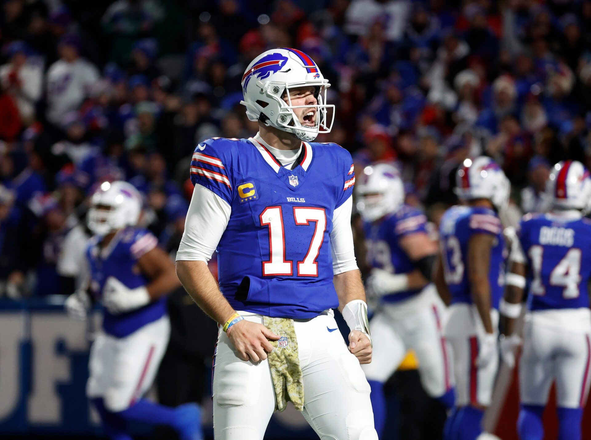 Buffalo Bills quarterback Josh Allen (17) celebrates his 81 yard touchdown pass to Buffalo Bills wide receiver Khalil Shakir (10).