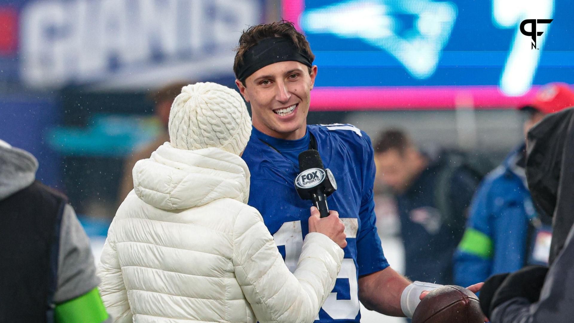 New York Giants quarterback Tommy DeVito (15) talks with Fox Sports media after the game against the New England Patriots at MetLife Stadium.