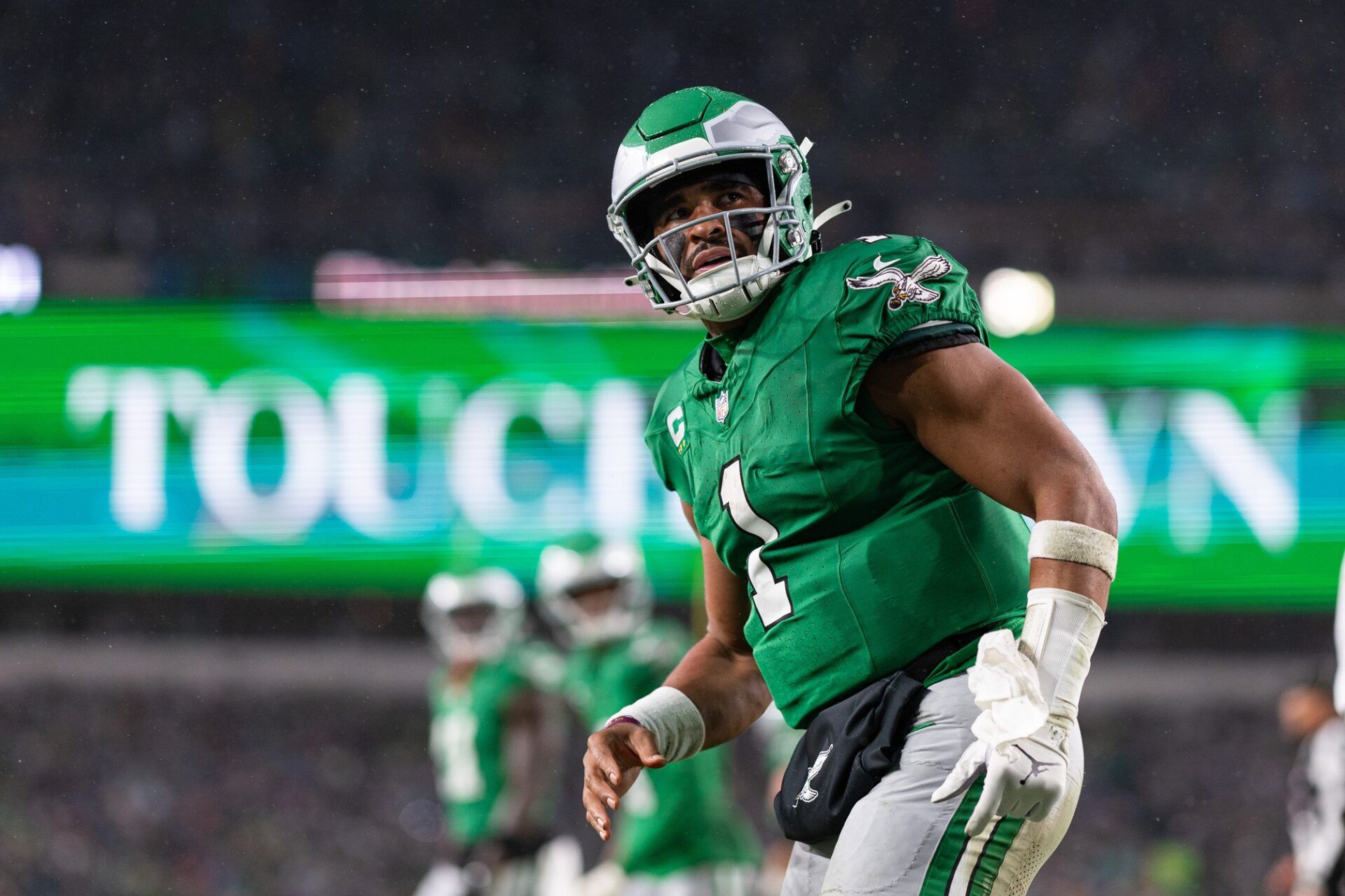 Jalen Hurts (1) looks into the stands after scoring a touchdown against the Buffalo Bills during the first quarter at Lincoln Financial Field.