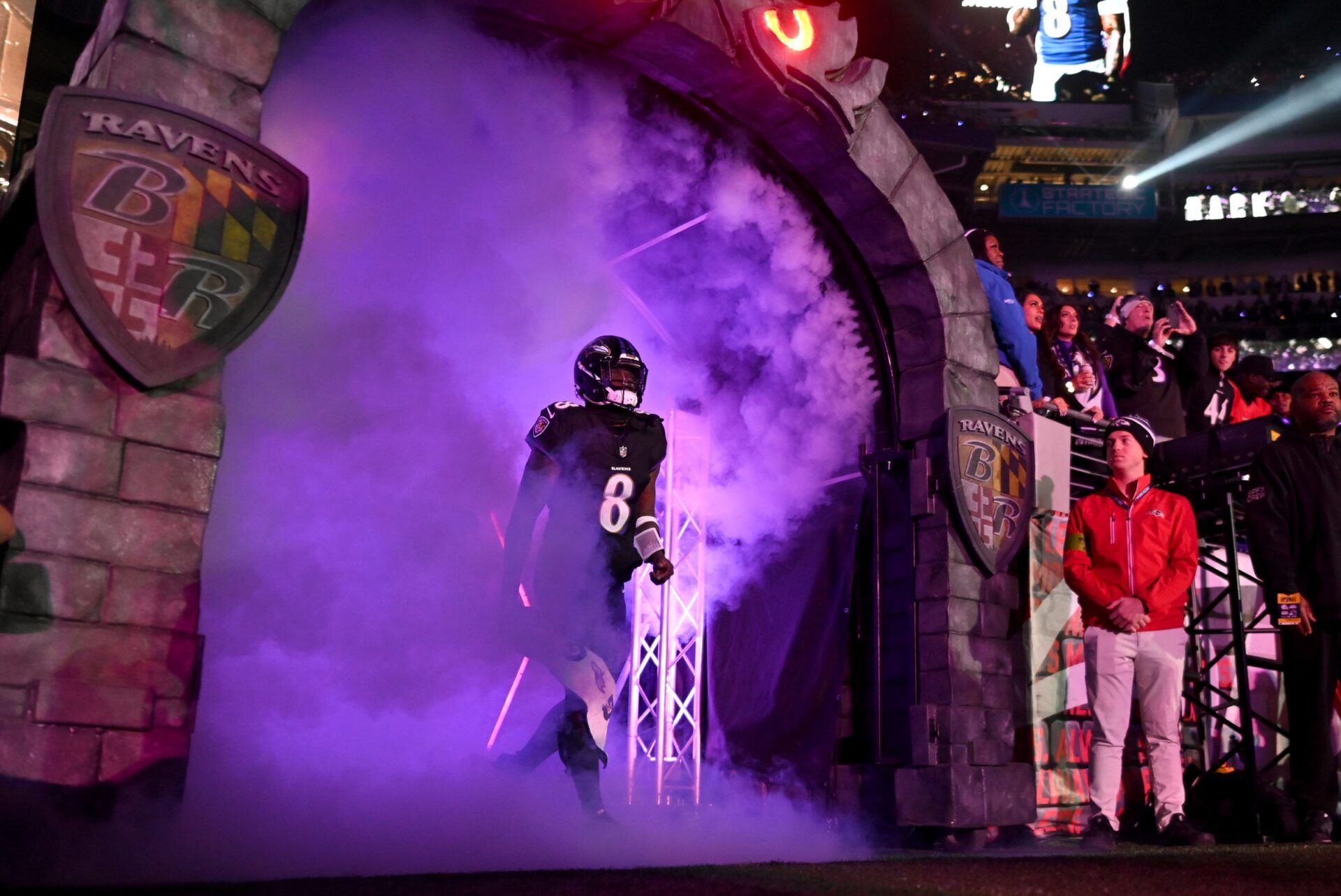 Baltimore Ravens quarterback Lamar Jackson (8) is introduced before a game against the Cincinnati Bengals at M&T Bank Stadium.