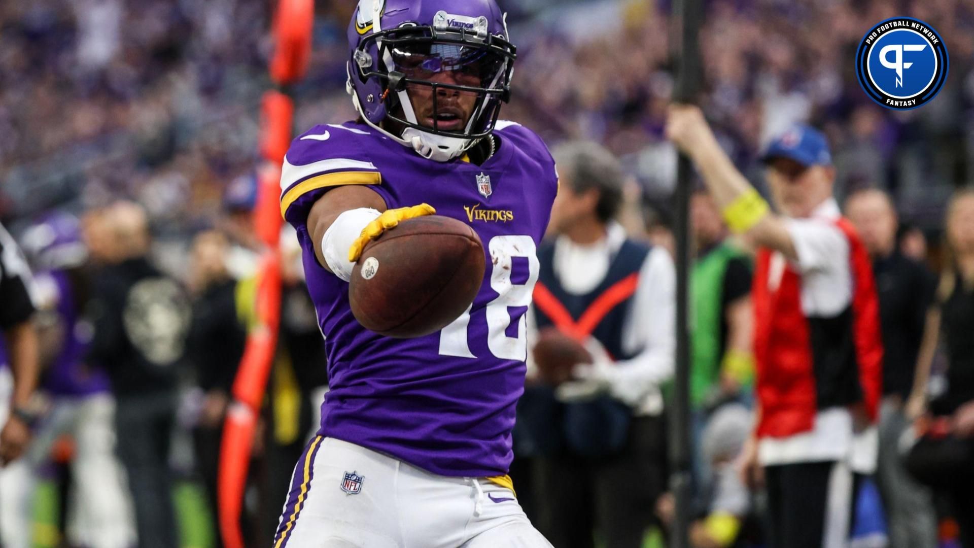 Minnesota Vikings WR Justin Jefferson (18) catches a touchdown pass against the Indianapolis Colts.