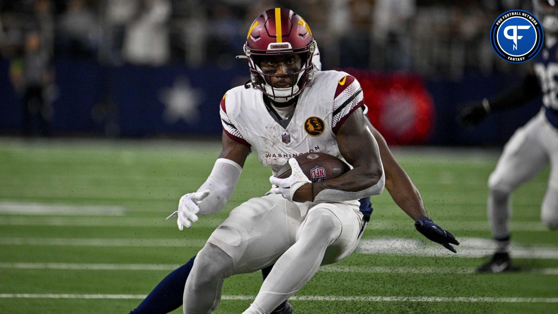 Curtis Samuel (4) in action during the game between the Dallas Cowboys and the Washington Commanders at AT&T Stadium.