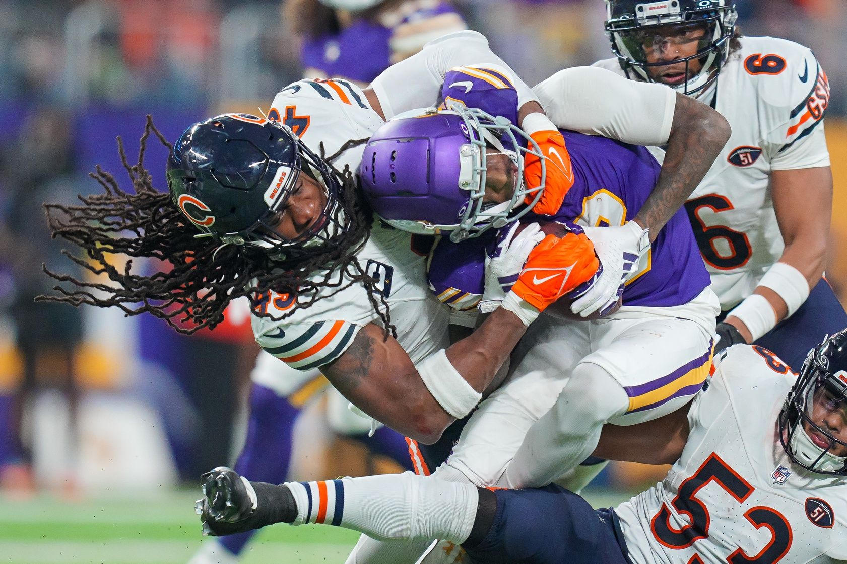 Chicago Bears linebacker Tremaine Edmunds (49) tackles Minnesota Vikings wide receiver Jordan Addison (3) in the fourth quarter at U.S. Bank Stadium.