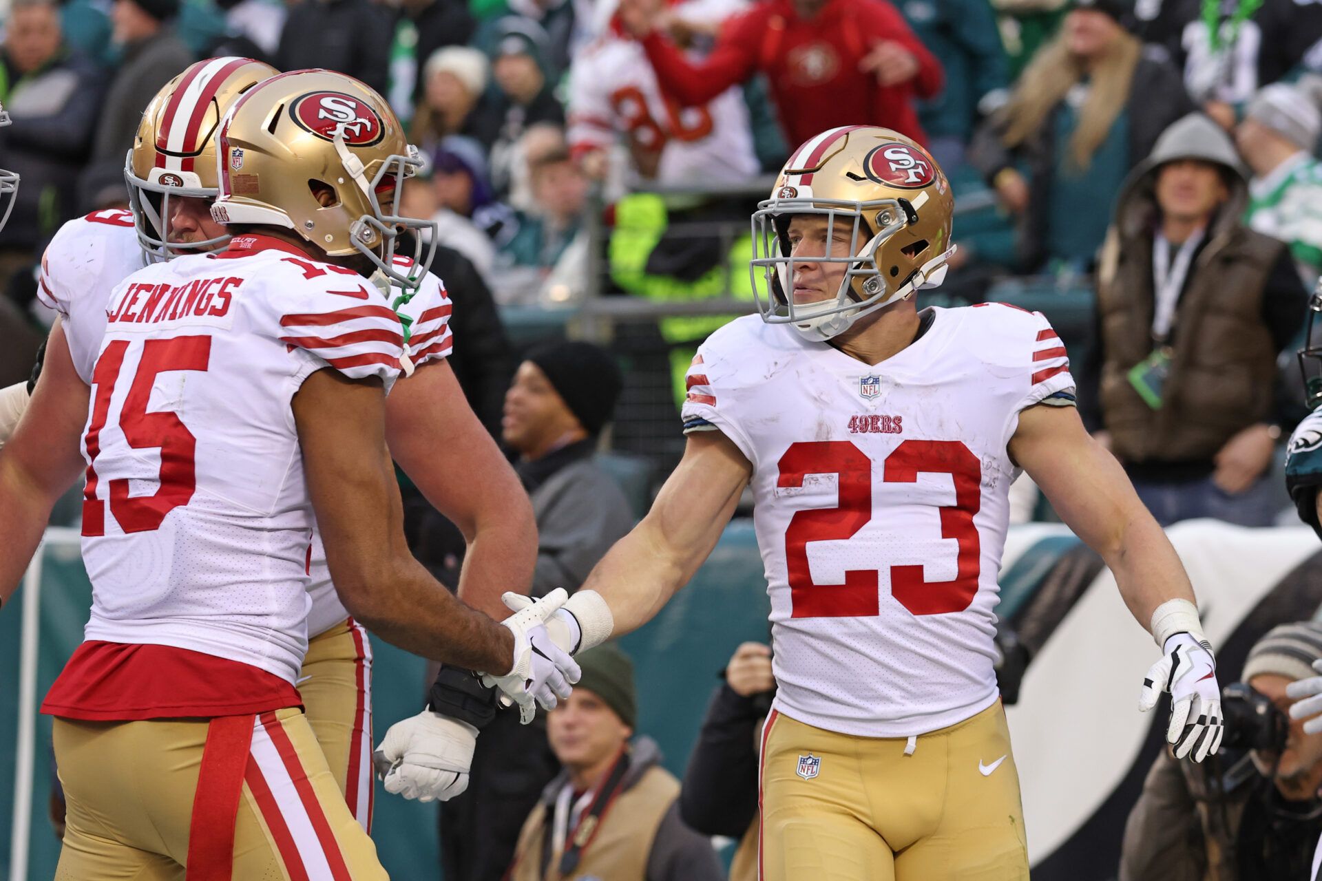 San Francisco 49ers running back Christian McCaffrey (23) celebrates his 23-yard touchdown run with wide receiver Jauan Jennings (15) against the Philadelphia Eagles during the second quarter in the NFC Championship game at Lincoln Financial Field.