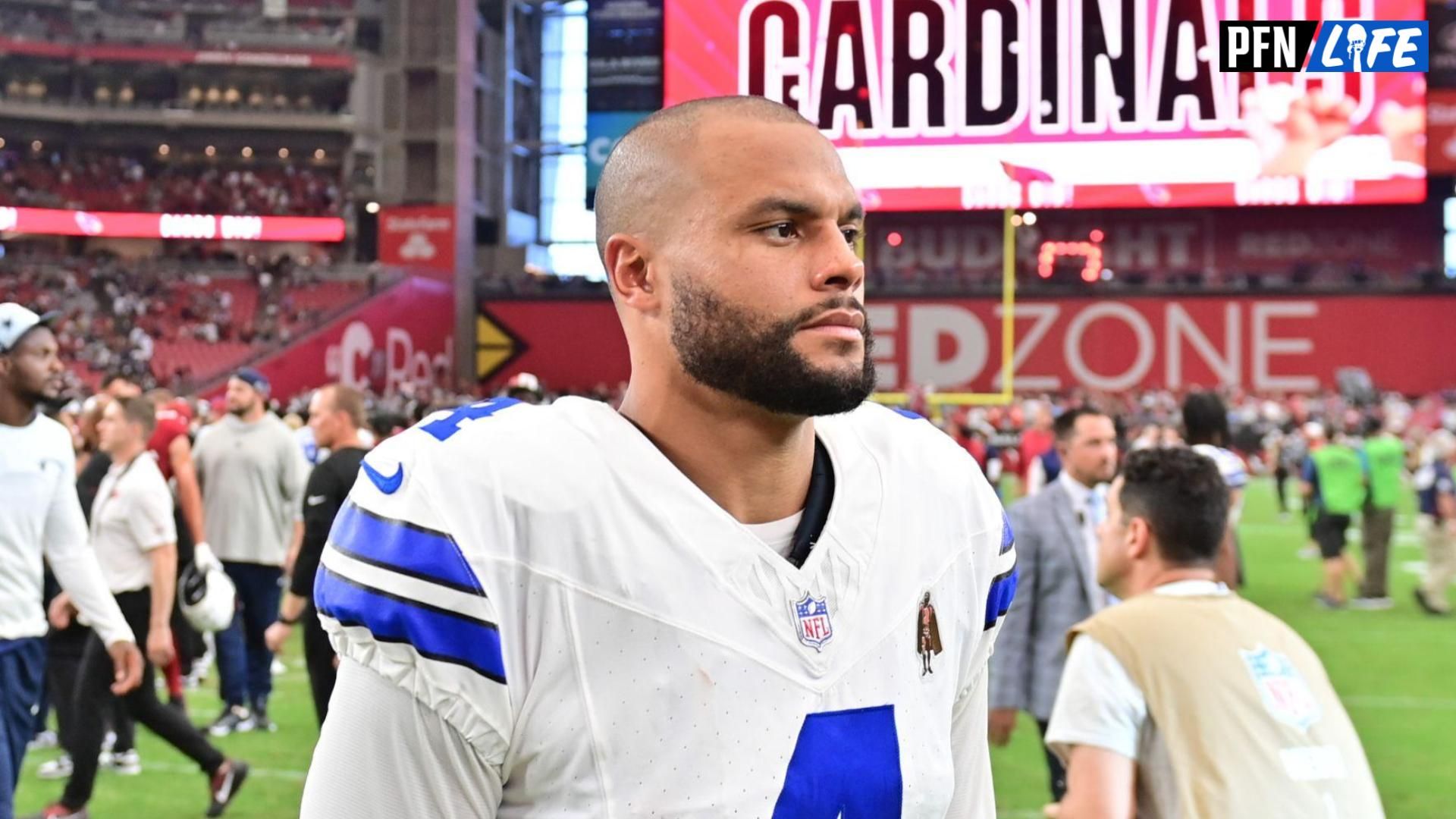 Dallas Cowboys quarterback Dak Prescott (4) reacts after losing to the Arizona Cardinals at State Farm Stadium.