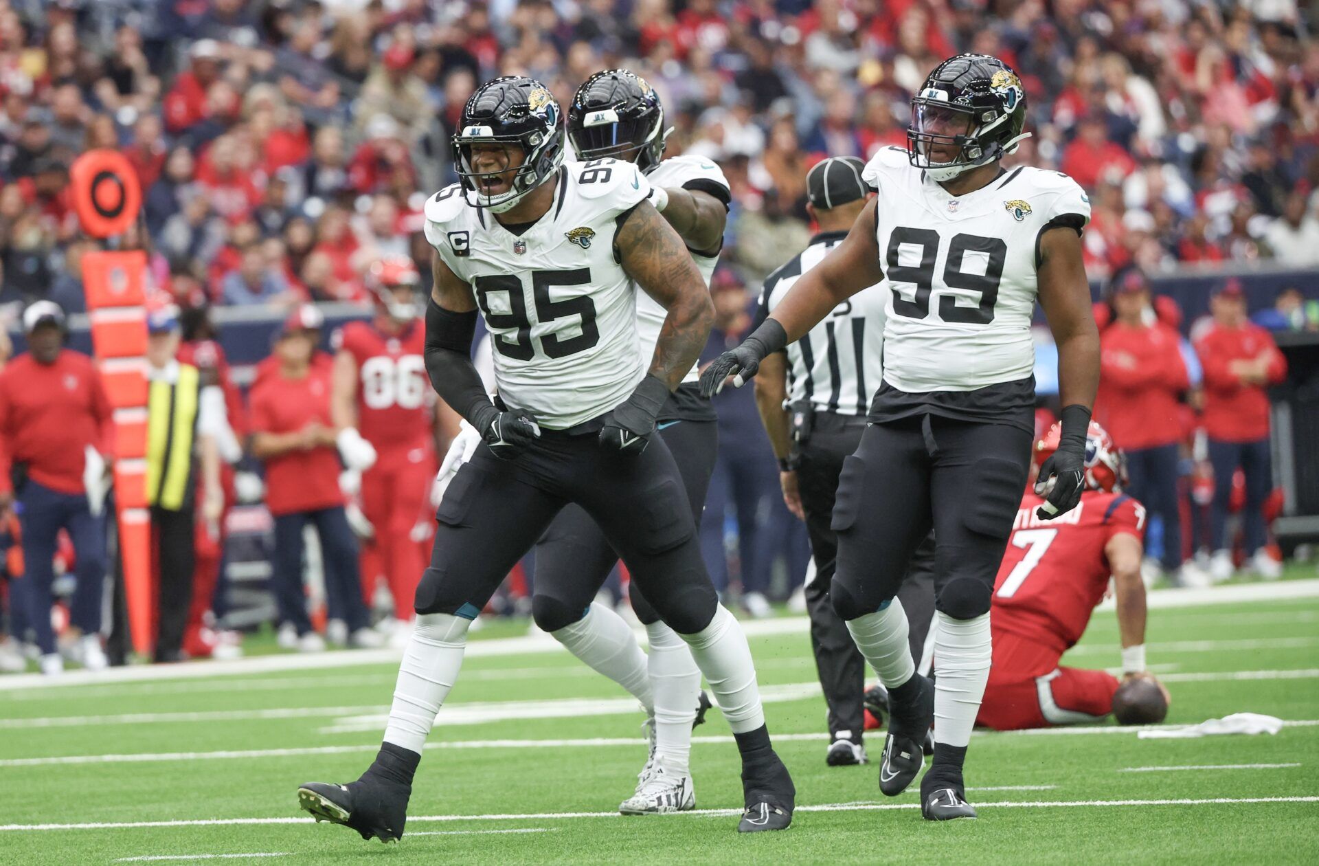 Jacksonville Jaguars defensive end Roy Robertson-Harris (95) reacts after sacking Houston Texans quarterback C.J. Stroud (7).