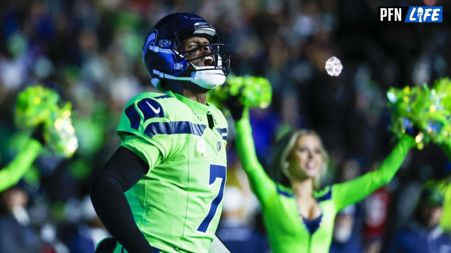 Geno Smith (7) is introduced before kickoff against the San Francisco 49ers at Lumen Field.