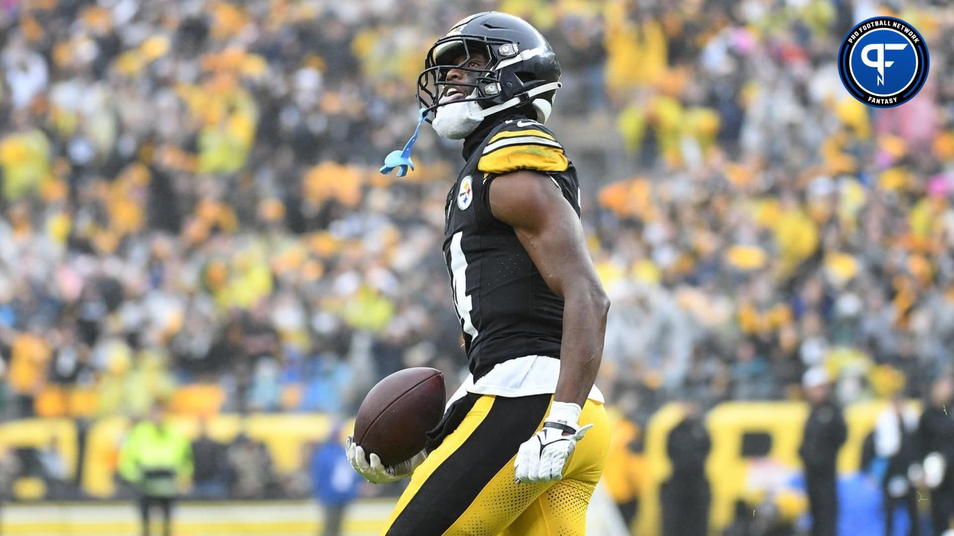 George Pickens (14) celebrates a third quarter touchdown against the Jacksonville Jaguars at Acrisure Stadium.