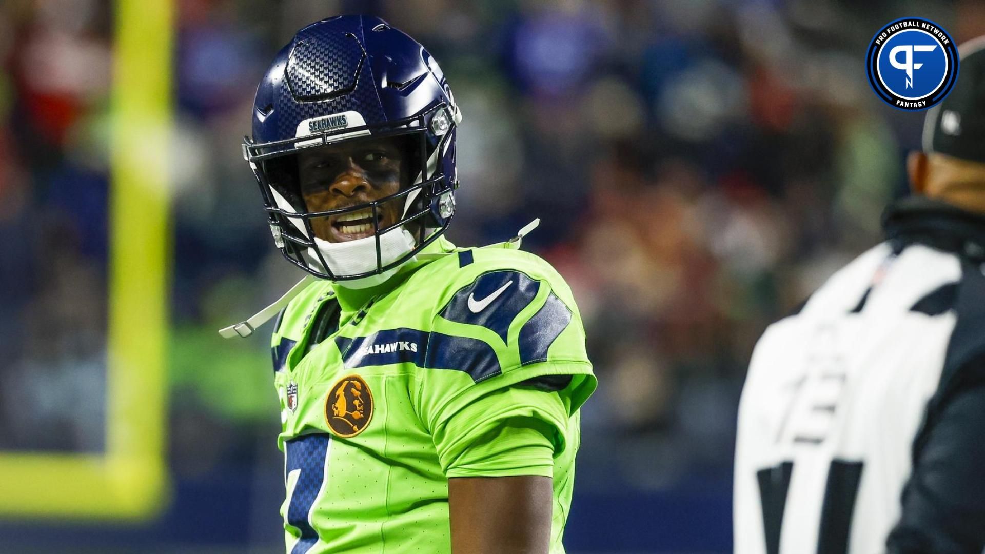 Geno Smith (7) reacts towards a referee following a play against the San Francisco 49ers during the third quarter at Lumen Field.