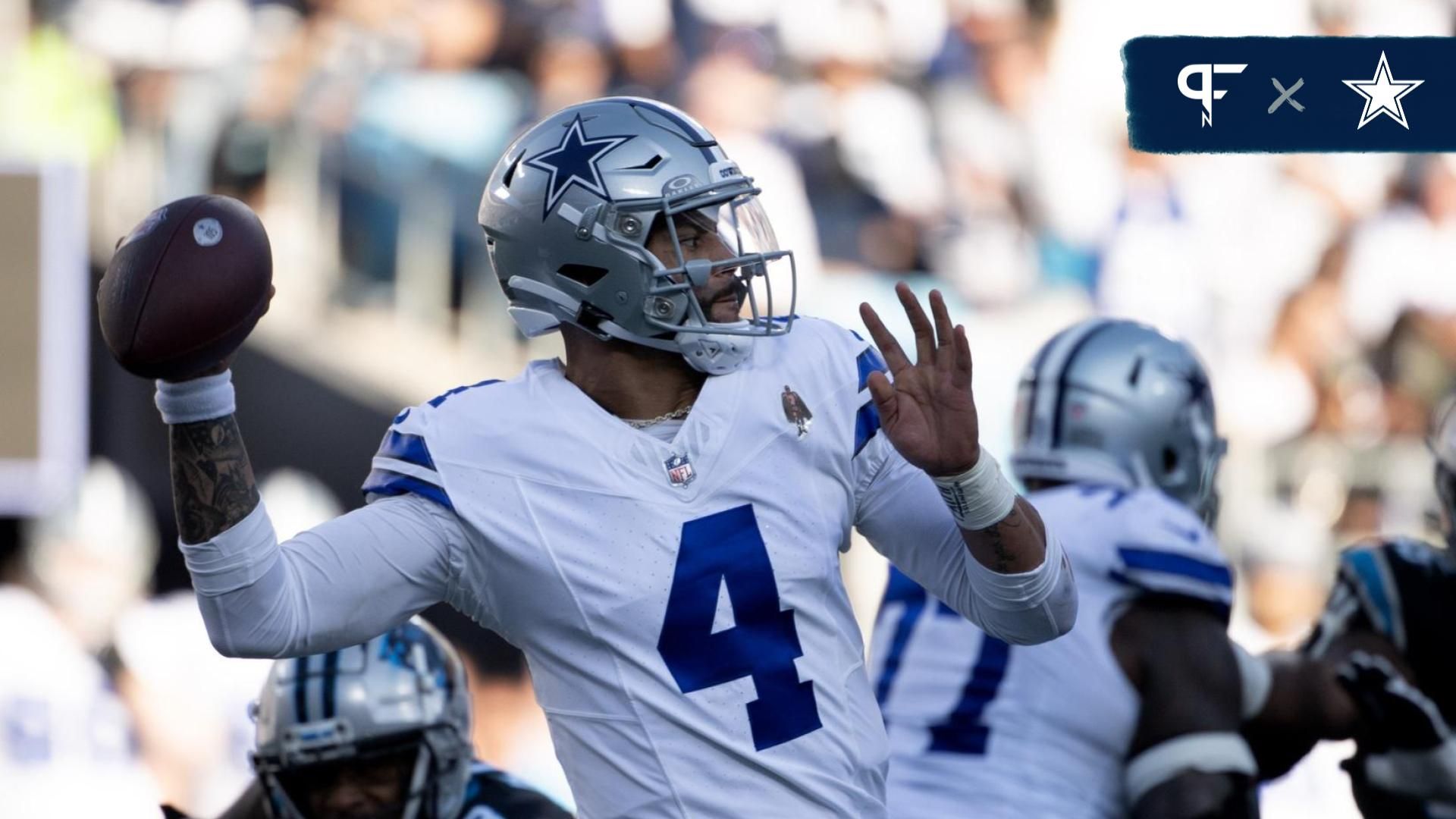 Dallas Cowboys quarterback Dak Prescott (4) looks to pass in the third quarter at Bank of America Stadium.